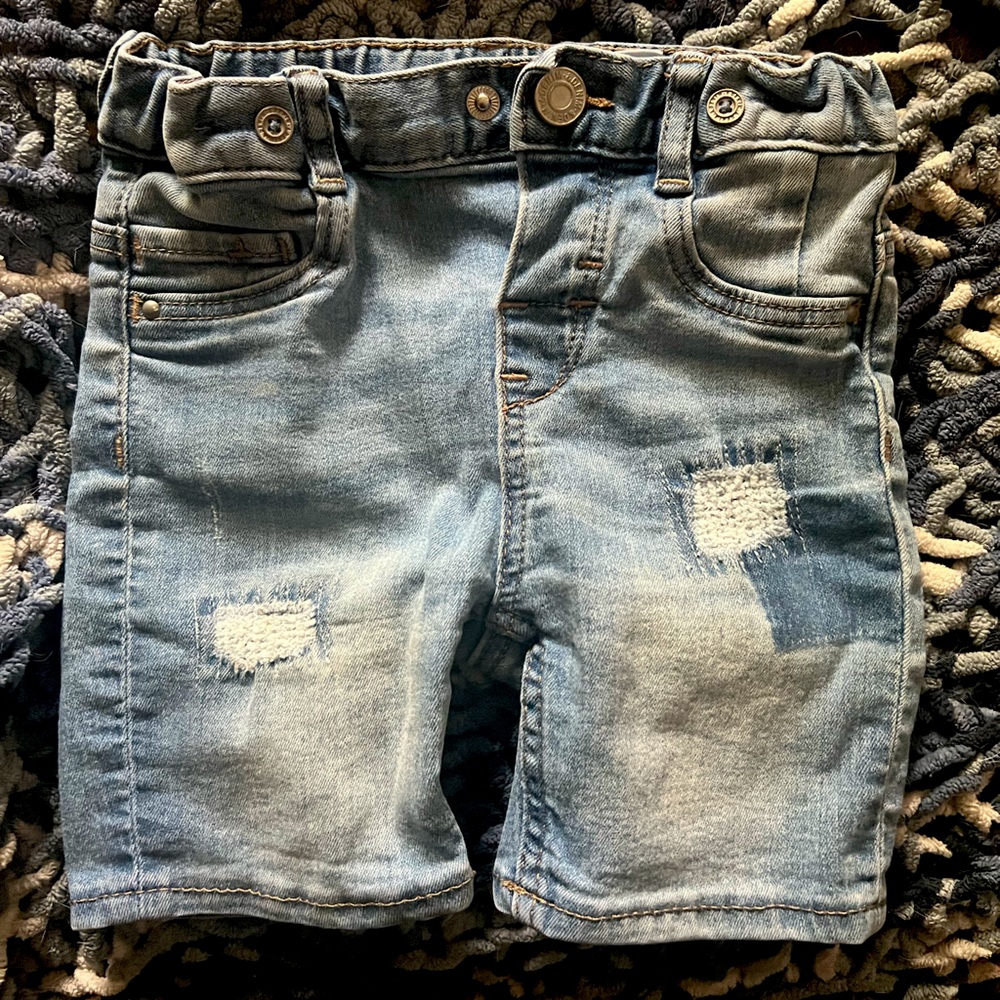 “H&M”, 12-18 month jeans. With a cute patchwork design and comfy soft denim 💗